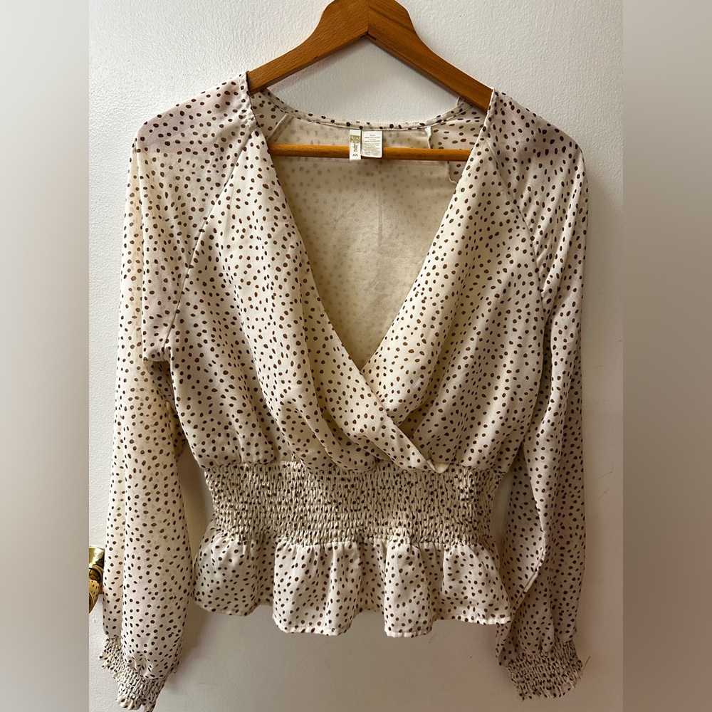 Japna Faux Wrap Top

Size Medium